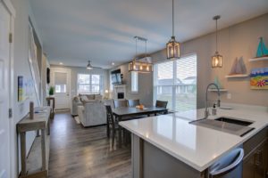 The kitchen and living area of a vacation rental in Ocean Shores near top spots for flying kites.