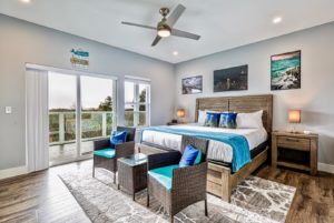 A bedroom in an Ocean Shores rental to relax in after exploring on moped rentals.