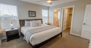 A cozy bedroom to relax in after exploring Ocean Shores stores.