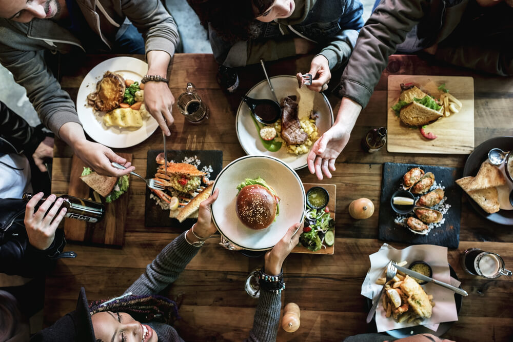 A group eating out at one of the top Ocean Shores restaurants.