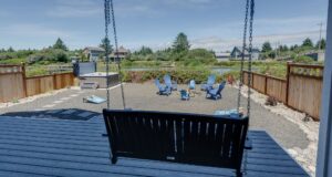 The back porch of an Ocean Shores rental to relax on after looking for shells on the beach.